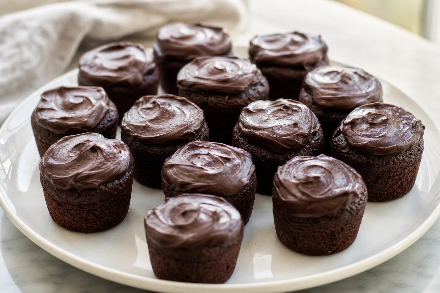 Cupcakes de chocolate sin gluten con ganache montado