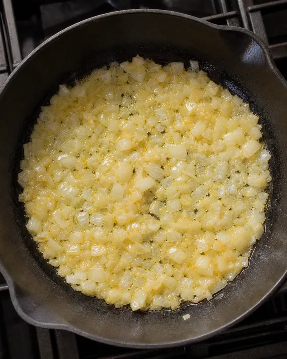 Onions sautéing in butter until translucent