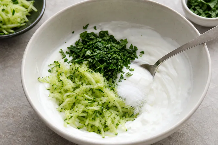 Grated cucumber, yogurt, mint, and salt combined for tzatziki