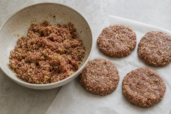 Lamb mixed with bulgur and spices shaped into burger patties